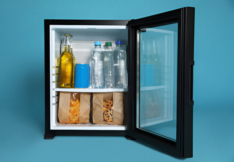 mini bar fridge filled with food and drinks